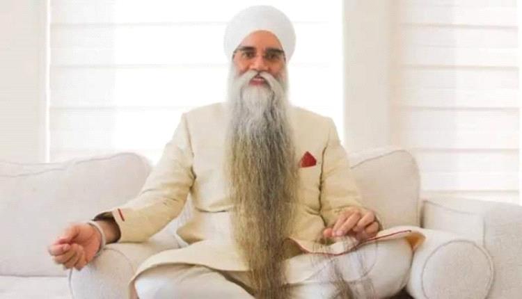 تعرف على صاحب أطول لحية في العالم (صور)