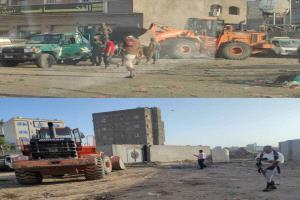 وحدة حماية الأراضي تزيل بناء عشوائي من أحد شوارع عدن 