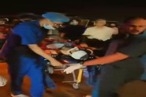 عملية إخلاء جرحى مصابين في تفجير موكب العميد حمدي شكري 
